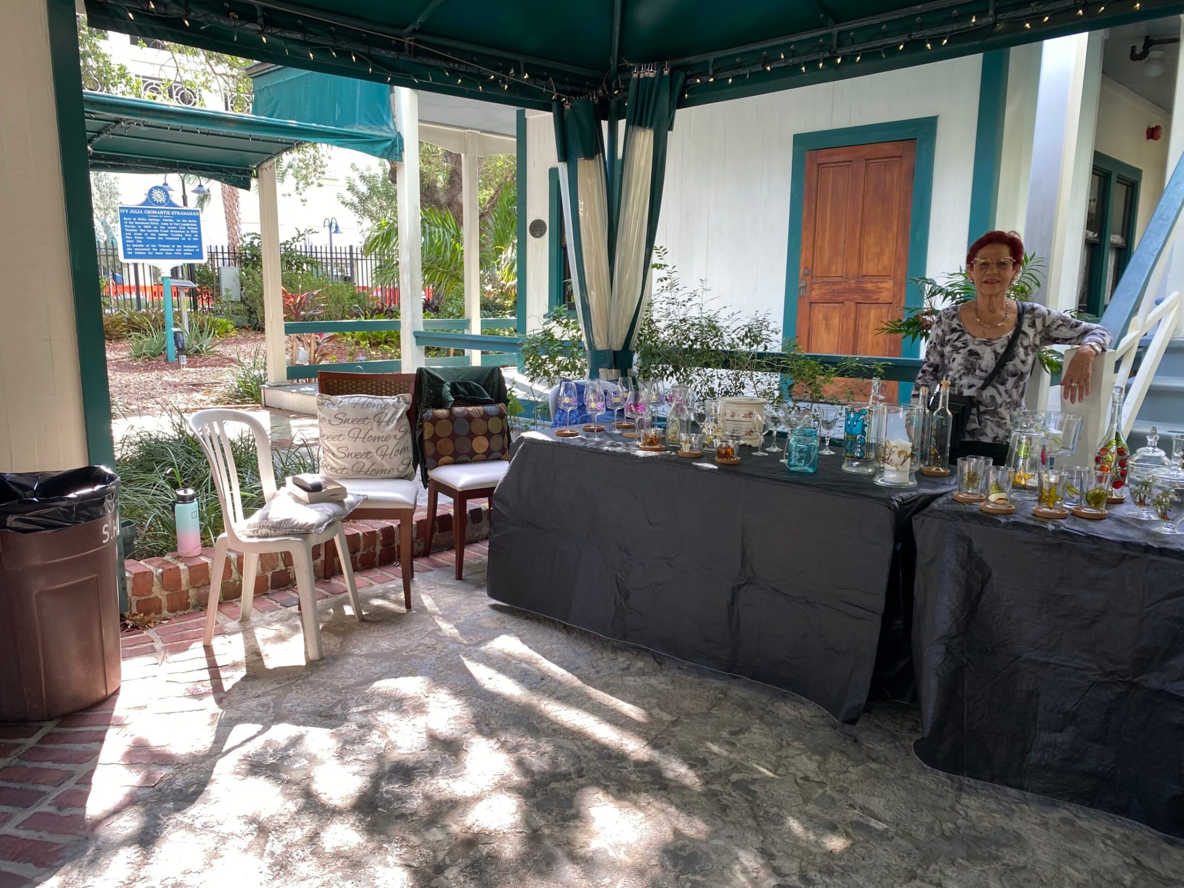 a room filled with furniture and a large window