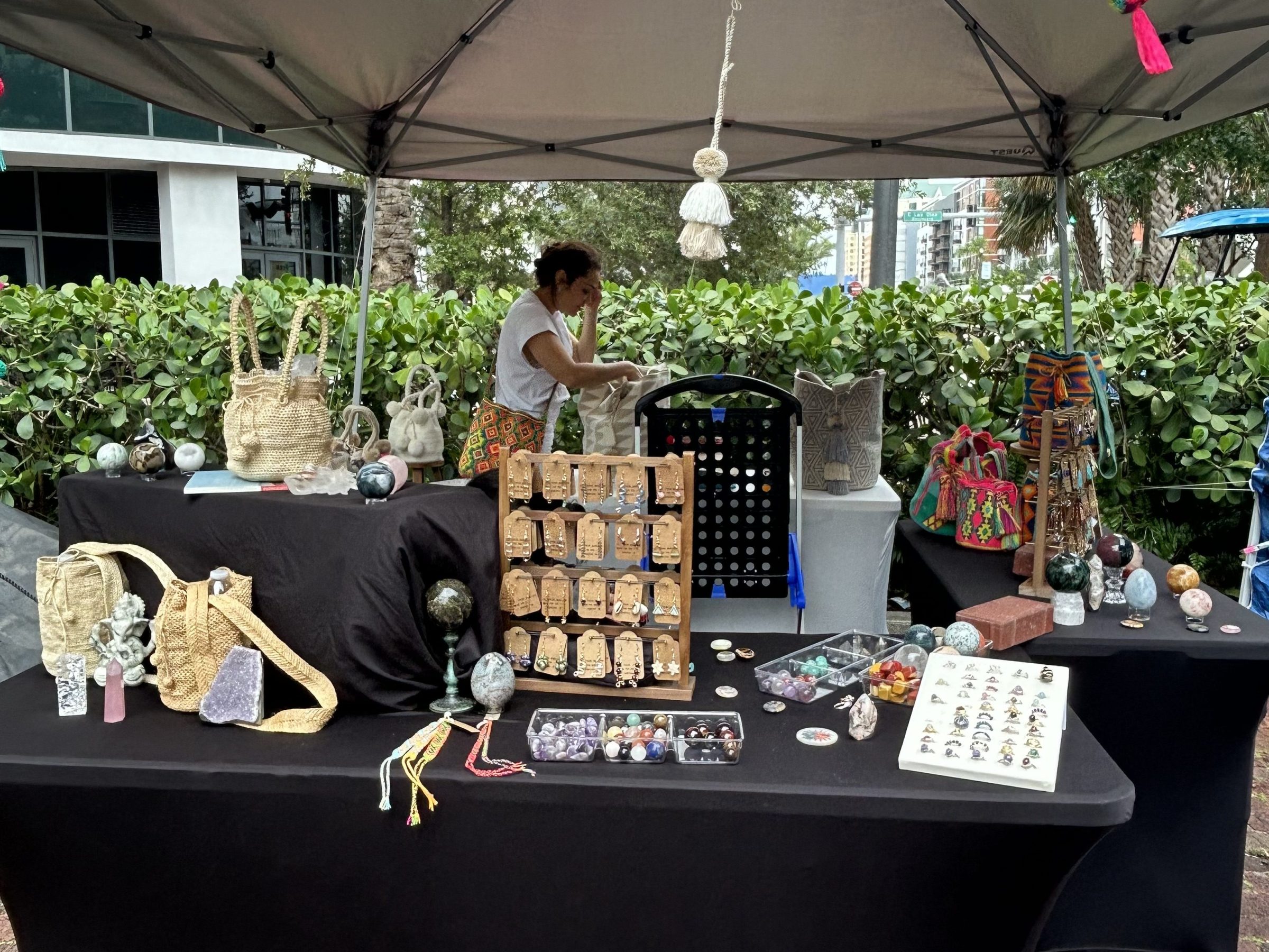a group of people sitting in front of a building