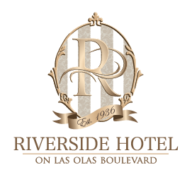 Riverside Hotel logo with ornate 'R' and 'Est. 1936' text.